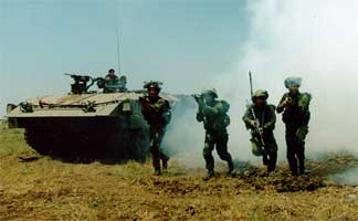 Golanis with Achzarit APC during training